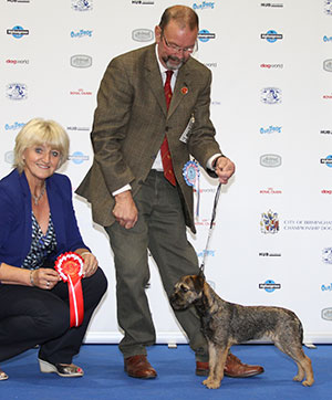 Mr G & Mrs S Pickering Picer Flora Mcivor with puppy group judge Mrs P HollingsN