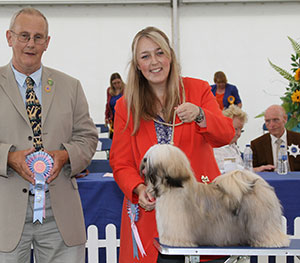 Mrs A G O'Doherty Marnbri Tiger Lily Under Autumnspell with puppy group judge Mr B Reynolds-Frost 