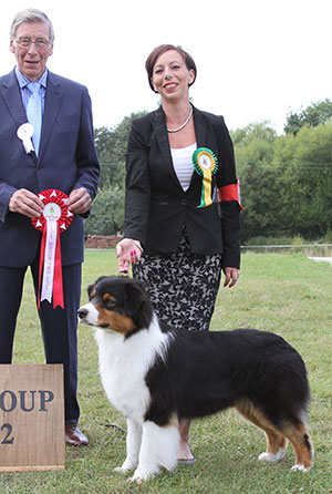 Miss M Spavin Ch & Croat Jun Ch Hearthside Man Of Mystery At Dia with group judge Mr J Carter