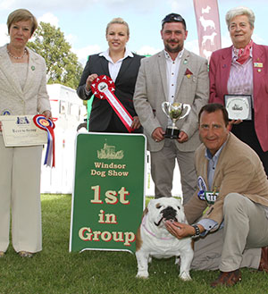 Mr & Mrs P & H Seal Ch Sealaville He's Tyler with group judge Miss E Haapaniemi, Mrs E Cartledge (Vice Chairman) & L Carter (Royal Canin) 