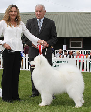 Mrs A Kirkwood & Miss N J Carruthers Ch Vandreem Imperial Cruz with group judge Mr R C Kinsey