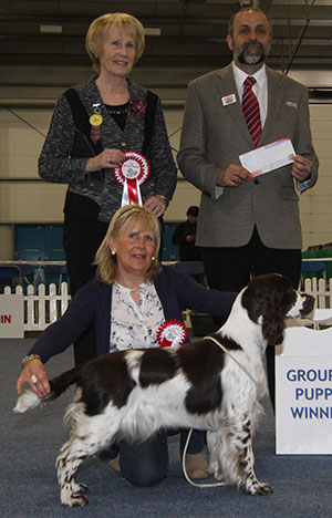 Mrs B Ganarin Peasblossom Orianna with puppy group judge Mrs E A Macdonald & Mr A Bongiovanni (Royal Canin)