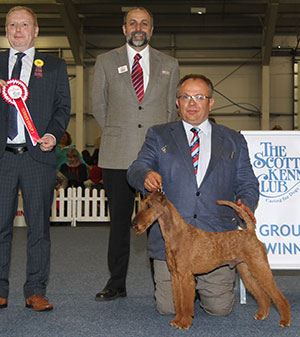 Mr & Mrs A & J Barker & Mr J Averis Lakeridge Cahal with group judge Mr M Vickers & Mr A Bongiovanni (Royal Canin)