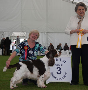 Mr S P & Mrs W M Walker Sh Ch Dexbenella It's About Time JW Sh.CM with group judge Mrs V Foss