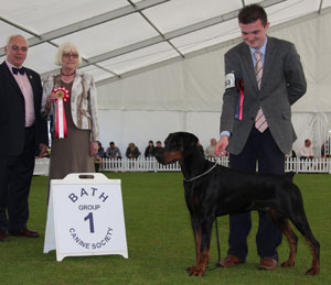 Miss T M Feeney Ch Italo Elite House (Imp) with group judge Mrs K S Wilberg & Mr W Browne-Cole (Chairman) 