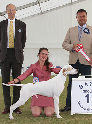 Mrs A Siddle & Miss A Siddle Wilchrimane Frankel (ai) with puppy group judge Mr P Harding & Mr C Laurence (President)