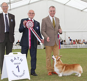 Mr K Dover & Mr l Saether Ch Pemcader Thunderball (Nbt) with group judge Mr B M Croft & Mr C Laurence (Pesident)