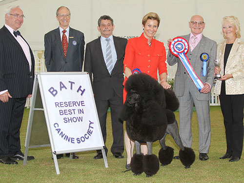 Miss C Sandell & Mr P Palmedal Multi Ch Huffish Rave The Rhythm with BIS judge Mr B M Coft, Mr B Ford (Secretary) & Mr W Browne-Cole (Chairman) 