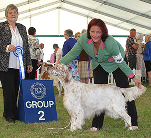 Mrs J Dennis & Miss S Roffey Sh Ch Mariglen Xanthe JW with group judge Mrs J Miller 