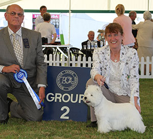 Miss M Burns & Mrs A Burns Burneze Our Marnie with group judge Mr P Bakewell