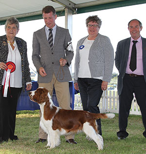 Mr J S Thirlwell Ferndel Glenfiddick with puppy group judge Mrs J Miller & Mr L Hunt (Committee) 