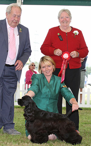 Miss S Crummy, Mr T Atkinson & Mr A Yau Afterglow Life Of Brian with puppy group judge Mrs P Blay & Mr J Farrant (Vice Chairman) 