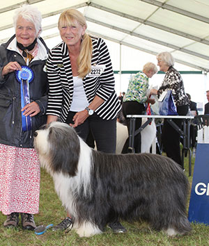 Mr M J & Mrs J Lewis Ch Potterdale Platinum Plus with group judge Miss J Lanning