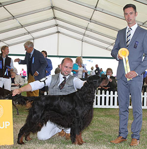 Mr D Alcorn, Mrs J Baddeley & Mr D Crowther Sh Ch Lourdace Fulcrum JW with group judge Mr R Bott