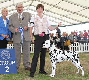 Mrs S Neath-Duggan & Miss S Baker Ch Buffrey Incognito By Dalleaf JW with group judge Mr B Day & Mrs A Dixon (Committee)