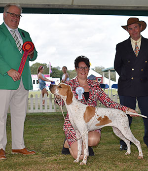 Mrs J M Harrison Millpoint Sound Wave with puppy group judge Mr R J Morris & Mr L Hunt (Committee) 