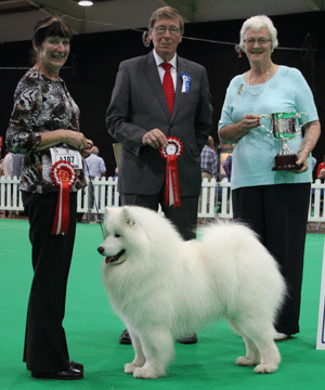 Mrs V Freer & Mrs S Smith Ch Nikara Diamond Dancer JW with group judge Mr J Carter & Mrs R Hall (committee)