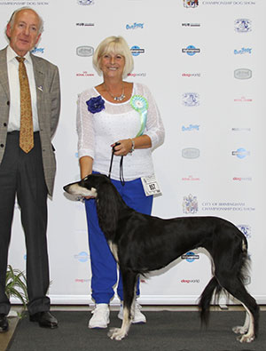 Mrs D Garratt & Miss S Oakey Ch Caryna Meilichia Sh CM with veteran group judge Mr K R Newhouse