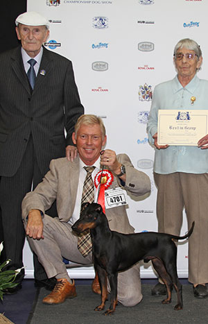 Mr H & Mrs E E Charlton Digelsa Done N' Dusted At Lizelms with group judge Mr L Aspin