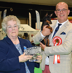 Mr N Gourley & Mr A Leonard Witchstone Unexpected Gift with puppy group judge Mrs M Deats
