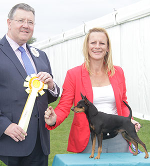 Mrs C J Collinson & Mrs S E Dare Ch Collypins Lickety Split Sh.CM with group judge Mr T Mather 