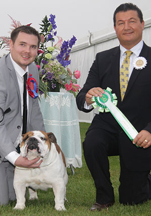 Mr S P Bragger UK Hun Eur Int Ch Prideofbully Winstone with group judge Mr P Harding