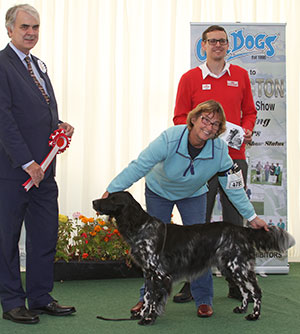 Mrs C Ogle & Mr R Butler Ch Raycris Freya JW with veteran group judge Mr G Dymock & Mr J Wolstenholme (Royal Canin)