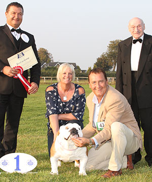 Mr & Mrs P & H Seal Ch Sealaville He's Tyler with group judge Mr P Harding & Mr M C Freeman (Secretary)