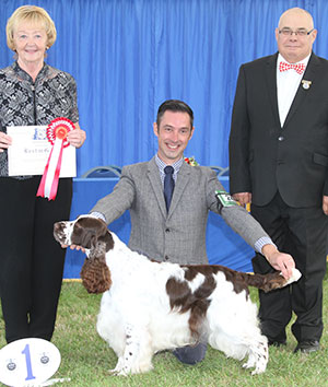 Mr R P Bott & Mrs C Savell Sh Ch Art-wave's Standing Ovation For Allenie (Imp) with group judge Mrs S Bunting & Mr C Woodward (Committee)