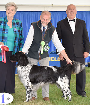Mr R Macgregor & Mr J & Mrs F Macgregor Sh Ch Jaudas Fame And Glory with veteran group judge Mrs C E Cartledge & Mr E Lockett (Treasurer)