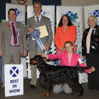 C A & P Sandiford & C Lewis Sh Ch Hernwood Calypso Goddess JW Sh.CM with BIS judge Mr M Gadsby, Mr G Haran (Secretary) & Miss M McCance (President)