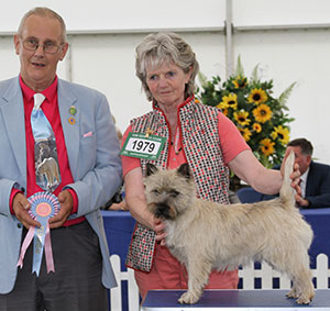 Mrs J I Yates & Mrs J Johnson Pendley Vivien with puppy group judge Mr B Reynolds-Frost 