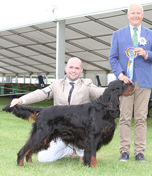 Mr D Alcorn, Mrs J Baddeley & Mr D Crowther Sh Ch Lourdace Fulcrum JW with group judge Mr P Iversen 