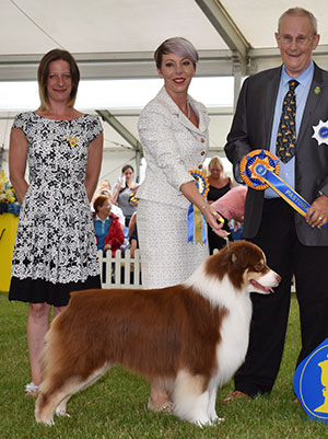 Mrs K Kirtley & Mrs D Erdesz AKC ASCA Ch Wyndstar Magic Marker with group judge Mr B Reynolds-Frost & Ms M Medlam (Treasurer) 