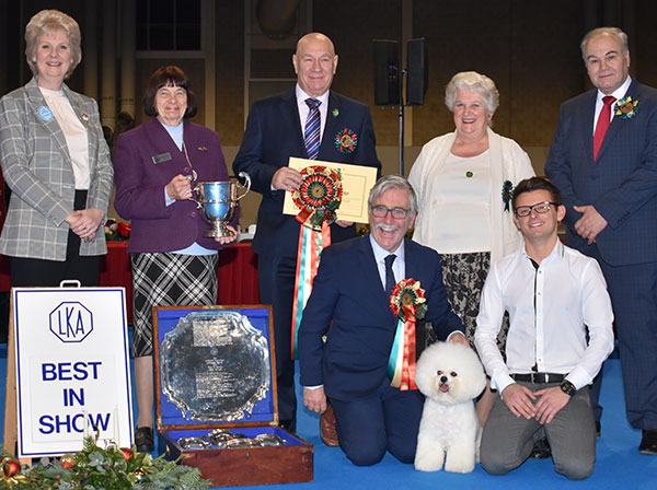 Messrs M Coad & R Smith Ch Regina Bichon You Rock My World at Pamplona with BIS judge Mr D Killilea, Miss J Kitchener (Chairman) & Mrs B Roderick 