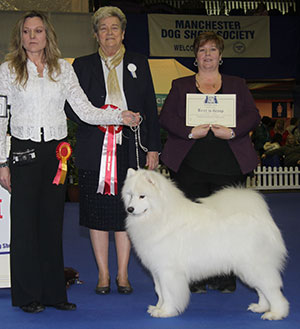 Mrs A Kirkwood & Miss N J Carruthers Vandreem Imperial Cruz with group judge Mrs C E Cartledge