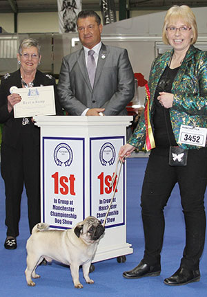 Mrs K A Storey Ch Rhodenash Kotten Klyde JW with group judge Mrs R Parry & Mr P Harding (Secretary)
