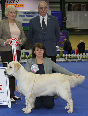 Miss S McCormack Flyngalee Tiptoes with puppy group judge Mrs E Stannard & Mr S Atkinson (Chairman)