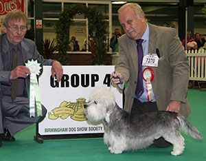 Mr & Mrs B Kerrush Inzievar Silver And Gold with group judge Mr D Munro 