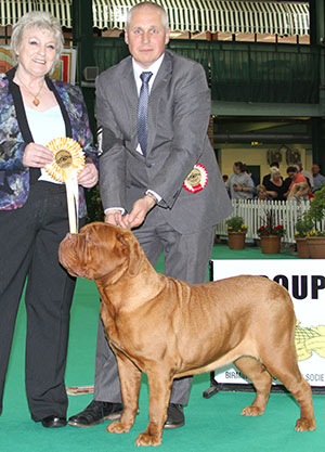 Mr & Mrs A & N Nattriss Ch Soultime Emberez Envy Sh.CM with group judge Mrs S Searle