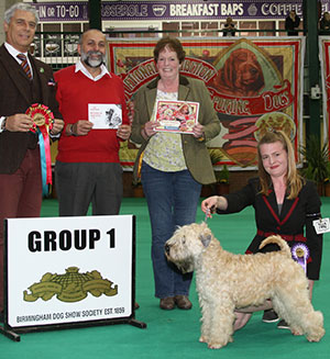 Mrs R H & Miss O F Busby Calvenace Killer Queen at Zakby with veteran group judge Dr T Jakkel & Mr A Bongiovanni (Royal Canin)