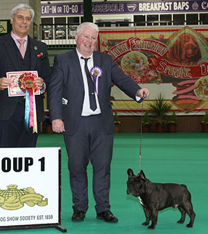 Mr D Cund & Mr & Mrs A Harrop Ch Chelmbull Moon Pilot with veteran judge Dr T Jakkel