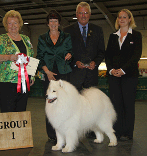 Mrs V Freer & Mrs S Smith Ch Nikara Diamond Dancer JW with group judge Mrs B Banbury, Mr D Creech (Chairman) & S Langdon (Royal Canin)