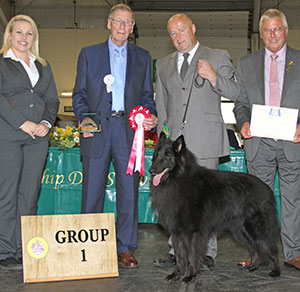 Mr P & Mrs J Lawless & Miss K Lawless Ch & Ir Ch Revloch Figo with group judge Mr J Carter, Mr D Creech (Chairman) & L Carter (Royal Canin)