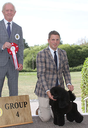 Mr J Shaw, Mr J Lynn & Mr T Isherwood Ch Afterglow Aloysius with group judge Mr T Johnston
