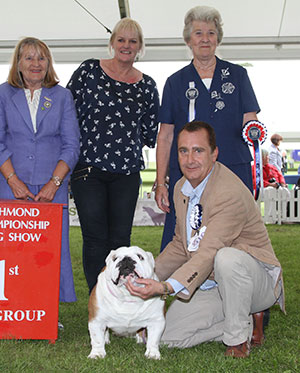 Mr & Mrs P & H Seal Ch Sealaville He's Tyler with group judge Mrs S L Jakeman & Mrs S Garner (Chief Steward)