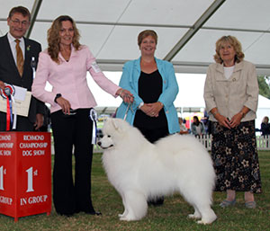 Mrs A Kirkwood & Miss N J Carruthers Ch Vandreem Imperial Cruz with group judge Kari Jarvinen & Mrs S Garner (Committee) 