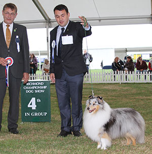 Mr E Castillo & Mr P Fortune Edglonian Blue Fortune with group judge Kavi Jarvinen