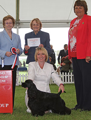 Miss S Crummey, Mr T Atkinson & Mr A Yau Afterglow Life Of Brian with puppy group judge Mrs S M Marshall, Mrs H Male (Treasurer) & J Buttle (PP) 