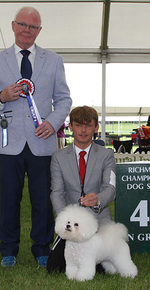 Mr M Coad Ch Hyde Park JP Smiling Face (Imp) with group judge Mr R Sansom